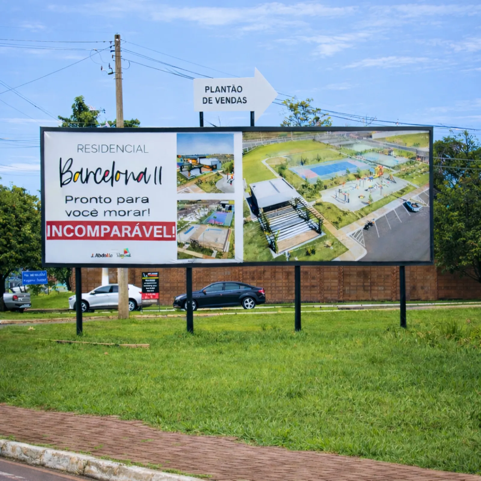 Outdoor 9x3 com lançamento Residencial Barcelona II e topper Plantão de Vendas, na rotatória da Av. José Ferreira Baptista, Araçatuba